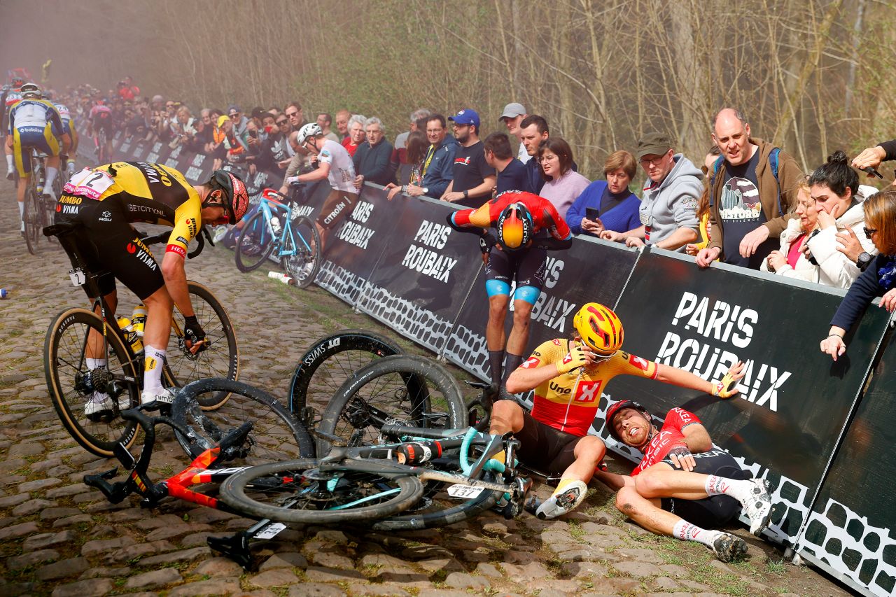 Cyclists react in the aftermath of a crash that took place during the Paris-Roubaix road race on Sunday, April 9. In the foreground, from left, are Edoardo Affini, Jonathan Milan, Kristoffer Halvorsen and Clément Russo.
