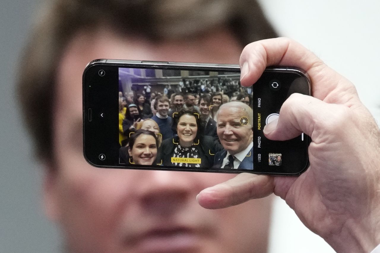 US President Joe Biden takes a selfie with audience members after speaking at the Ulster University's new campus in Belfast, Northern Ireland, on Wednesday, April 12. Biden left Washington, DC, on Tuesday for a <a href="https://www.cnn.com/2023/04/12/politics/biden-northern-ireland-visit-security-breach-intl-hnk/index.html" target="_blank">four-day visit</a> to Northern Ireland, which is part of the United Kingdom, and the Republic of Ireland.