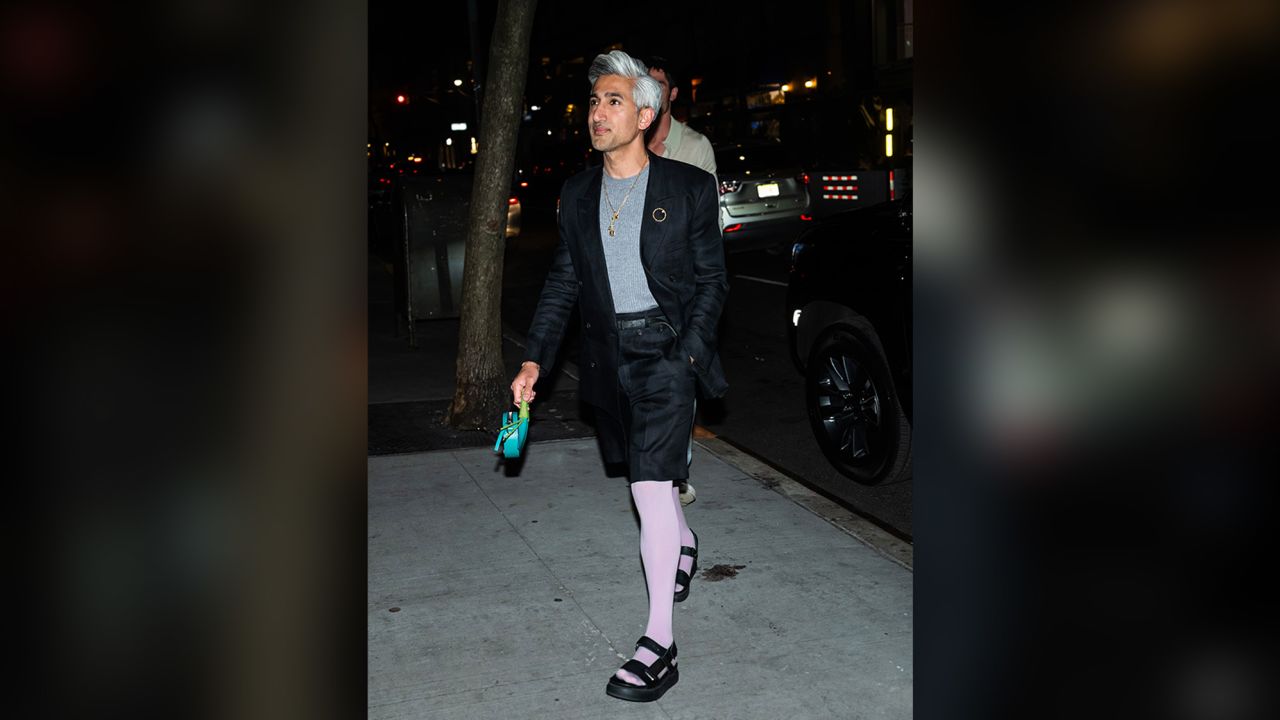 Tan France is seen wearing lilac tights on April 12, 2023 in New York City. 