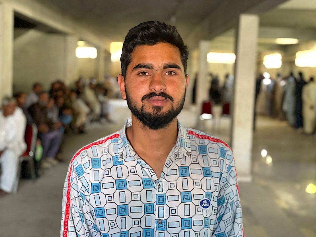 Tech worker Waqas Chaudhry, 20, has been standing in line since the early morning in Islamabad.