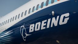 The Boeing logo is seen on the side of a Boeing 737 MAX during the Farnborough International Airshow 2022 on July 18, 2022 in Farnborough, England. 