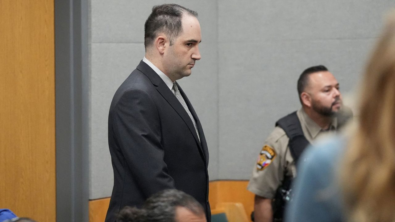 Daniel Perry walks into the courtroom at the Blackwell-Thurman Criminal Justice Center in Austin, Texas, on April 7.