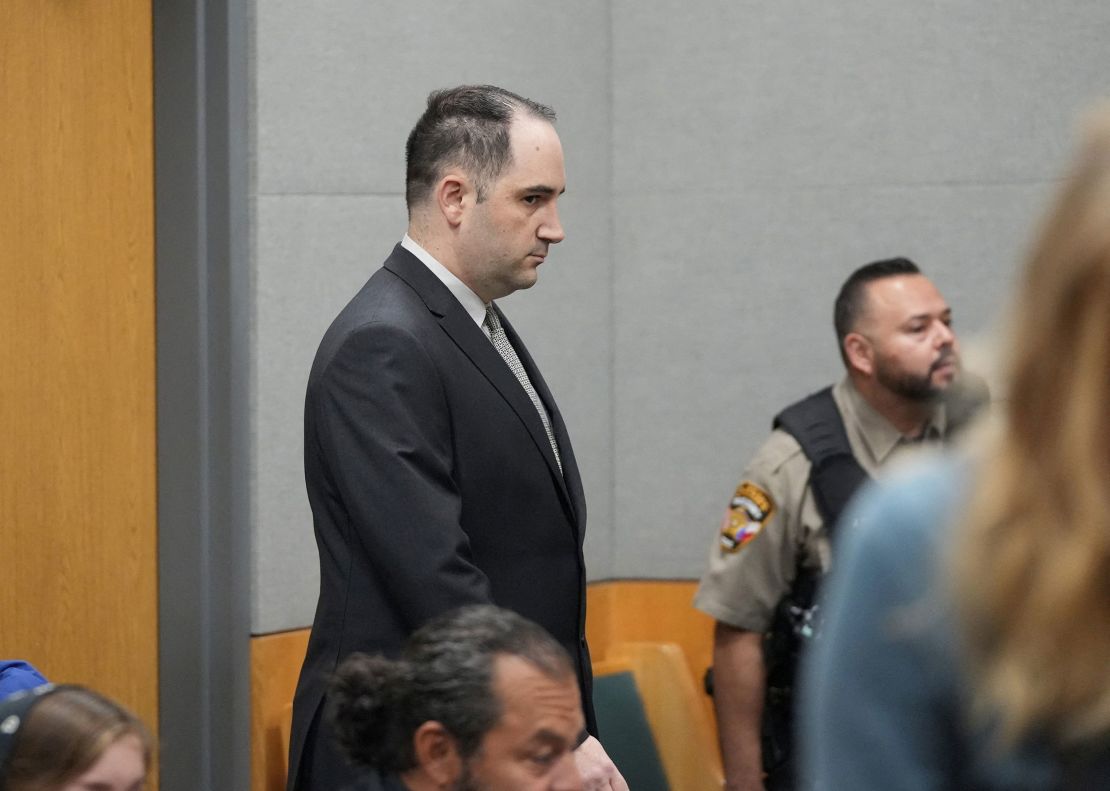 Daniel Perry walks into the courtroom at the Blackwell-Thurman Criminal Justice Center in Austin, Texas, on April 7.