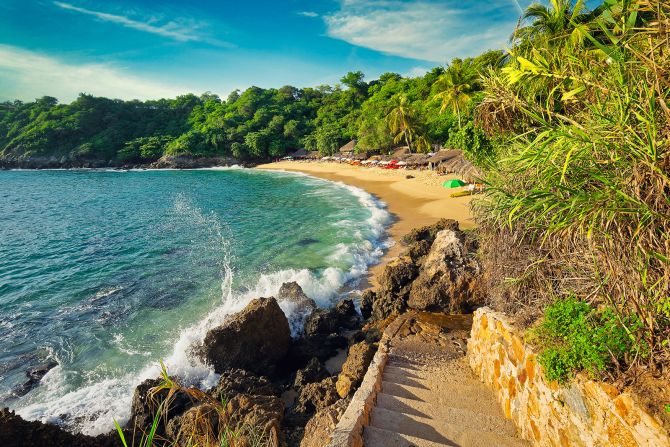 <strong>Puerto Escondido region, Oaxaca:</strong> At beautiful Playa Carrizalillo, beachgoers can rent a chair for the day and watch less skilled surfers taking lessons. The main beach, Playa Zicatela, is known for its high surfing waves.