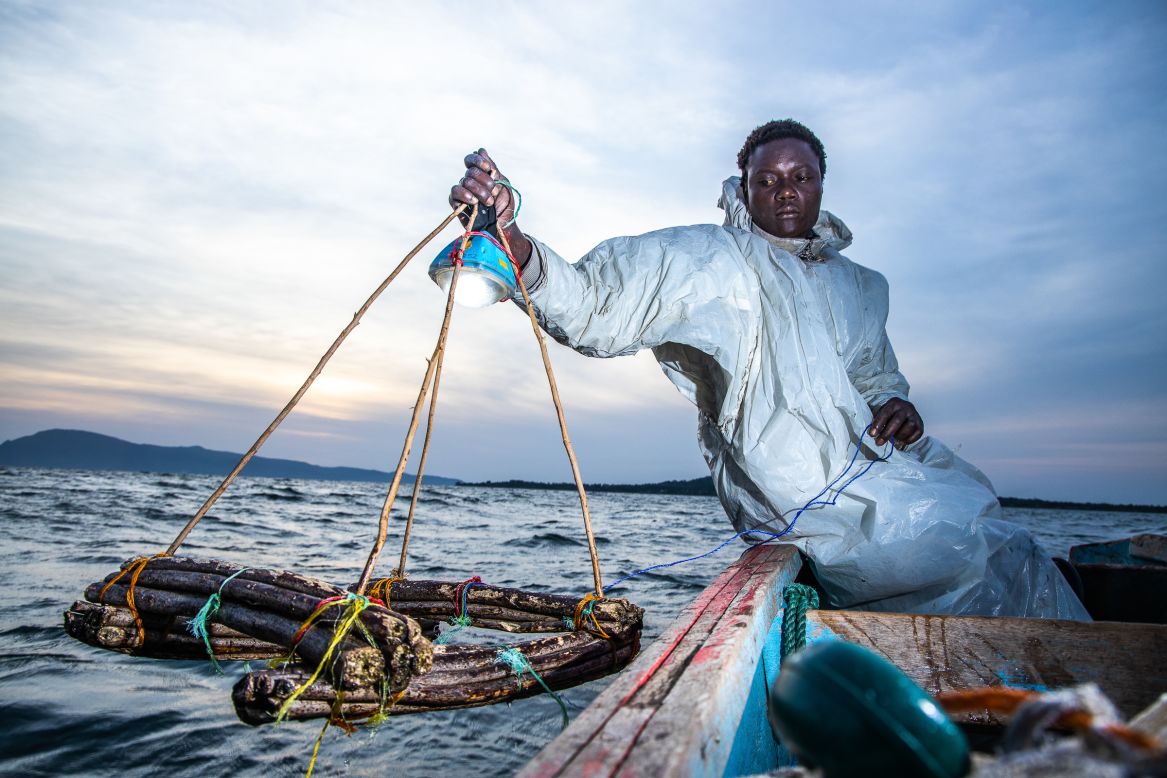 In his series, "<a href="https://www.tonywild.co.ke/powering-the-ghost-town-of-rusinga-island/" target="_blank" target="_blank">Powering the 'Ghost Town</a>' of Rusinga Island" Onyango tells the story of how local fisherman in Lake Victoria, Kenya, are combating climate change by switching from kerosene to solar-powered lamps when fishing.