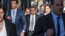 Sunny Balwani, former president of Theranos Inc., center, arrives at federal court in San Jose, California, US, on Wednesday, Dec. 7, 2022. Balwani, ex-boyfriend of Theranos founder Elizabeth Holmes, was found guilty of all charges against him for his role in the collapse of the $9 billion blood-testing startup. 