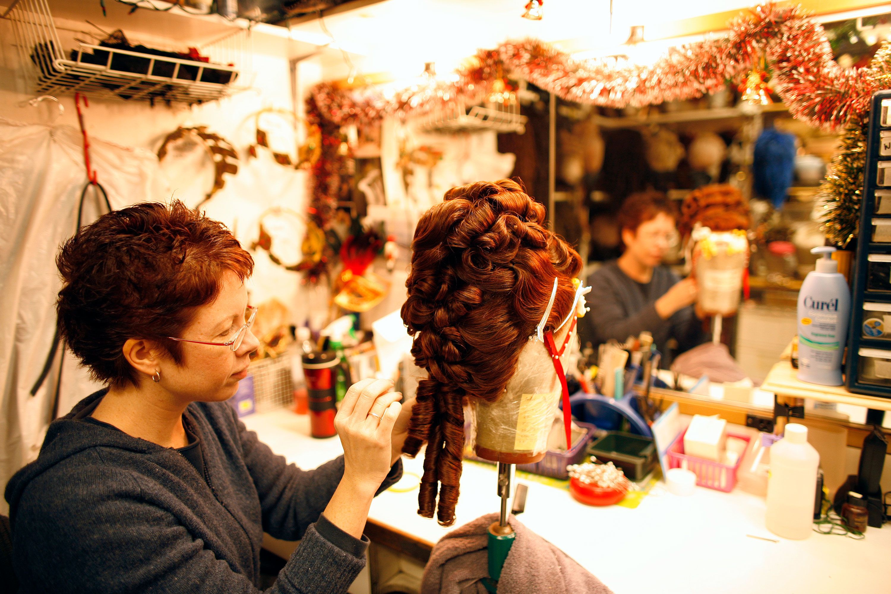 A hairstylist preps wigs in 2006.