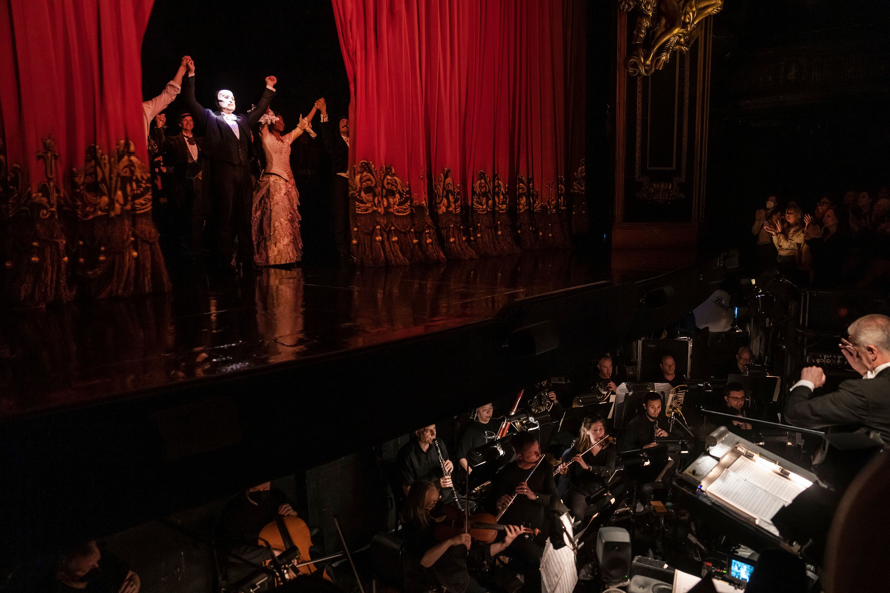 The pit orchestra plays during a curtain call in February 2023. 'Phantom' features Broadway's largest pit and includes 27 full-time musicians.