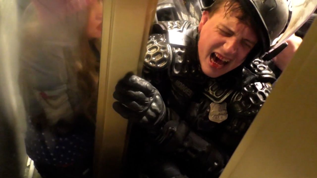 Metropolitan Police Officer Daniel Hodges being crushed in a doorway during the riot on January 6, 2021. 