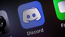 The Discord app is seen on an iPhone.
