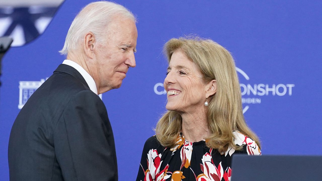 Biden is greeted by Caroline Kennedy as he arrives to deliver a speech at the John F. Kennedy Library and Museum in Boston on September 12, 2022. 