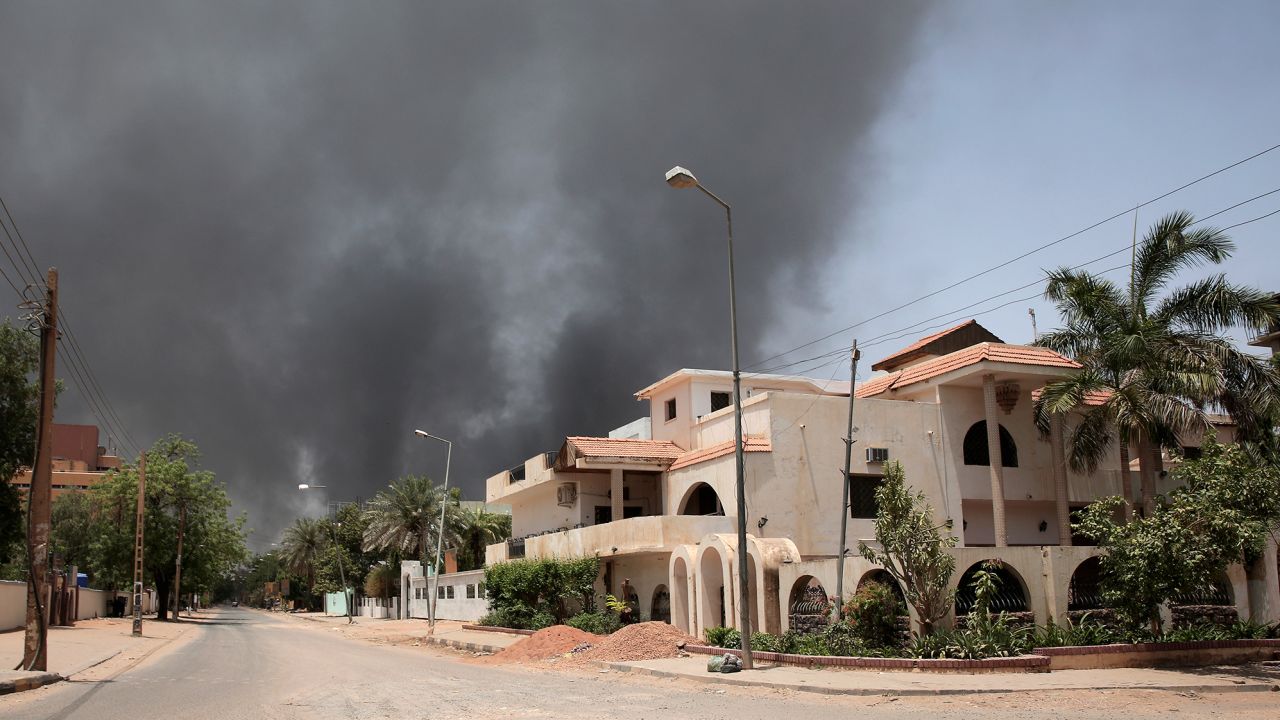 Smoke rises from a neighborhood in Khartoum, Sudan, Saturday, April 15, 2023. 