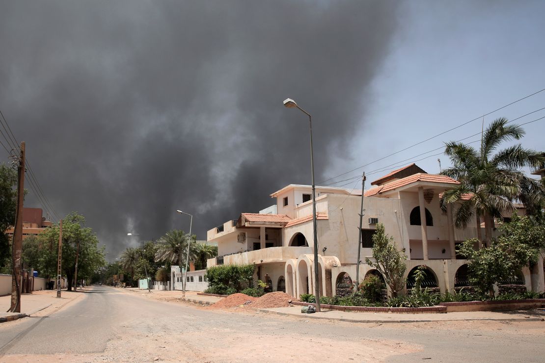 Smoke is seen rising from a neighborhood in Khartoum, Sudan, Saturday, April 15, 2023. 