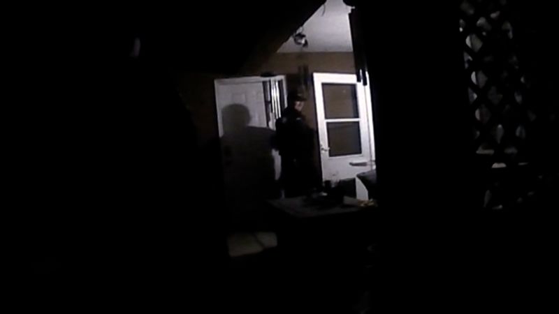 NextImg:Video shows officers shooting man after responding to wrong home | CNN