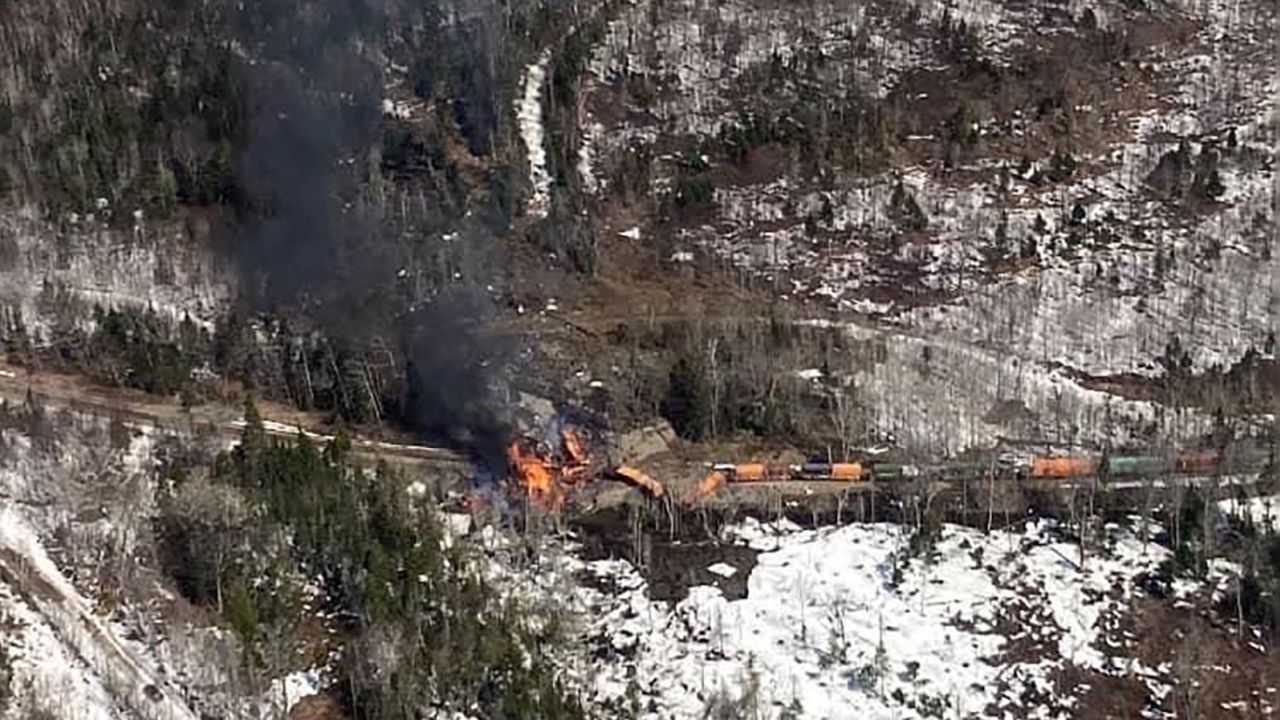 A train derailed north of Rockwood, Maine, causing a fire and concerns about the release of potentially hazardous materials, officials said. 