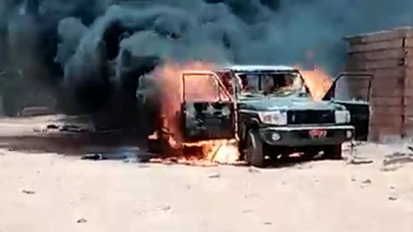 sudan military clashes car on fire