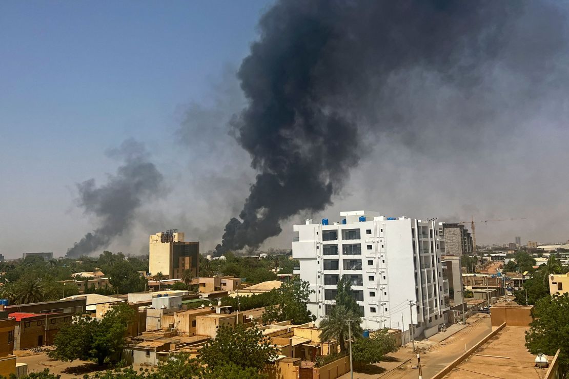 Smoke billows above residential buildings in Khartoum on April 16, 2023, as fighting in Sudan raged for a second day.