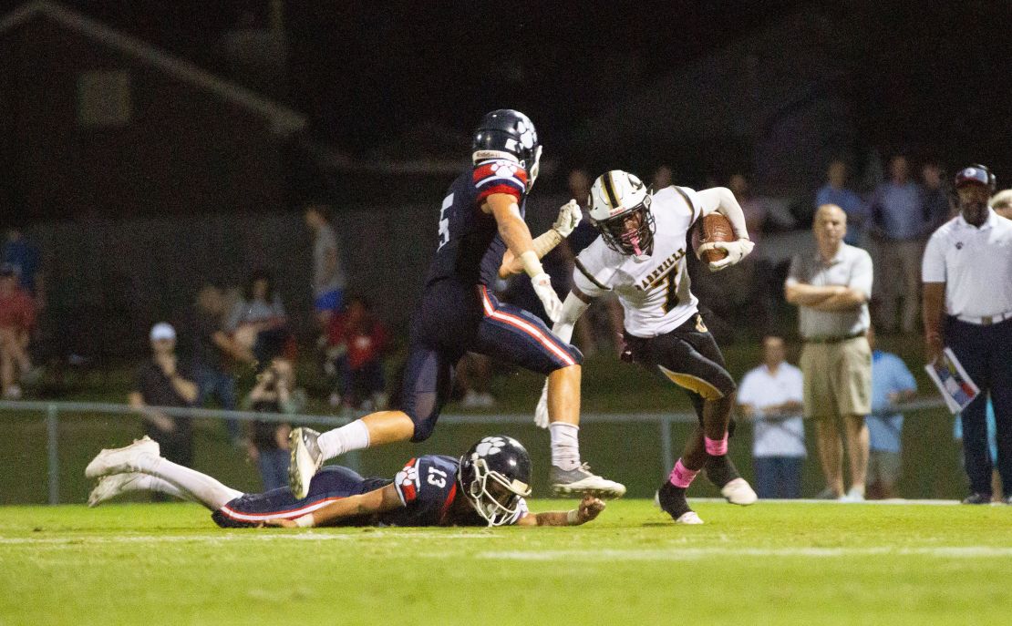 Dadeville's Philstavious Dowdell (7) fends off an opposing player during a football game on October 08, 2021.