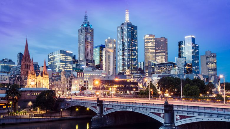 The sophisticated skyline of Melbourne comes alive as the city lights up as twilight descends over this modern city. Shot with a long exposure from Southbank across the Yarra River.