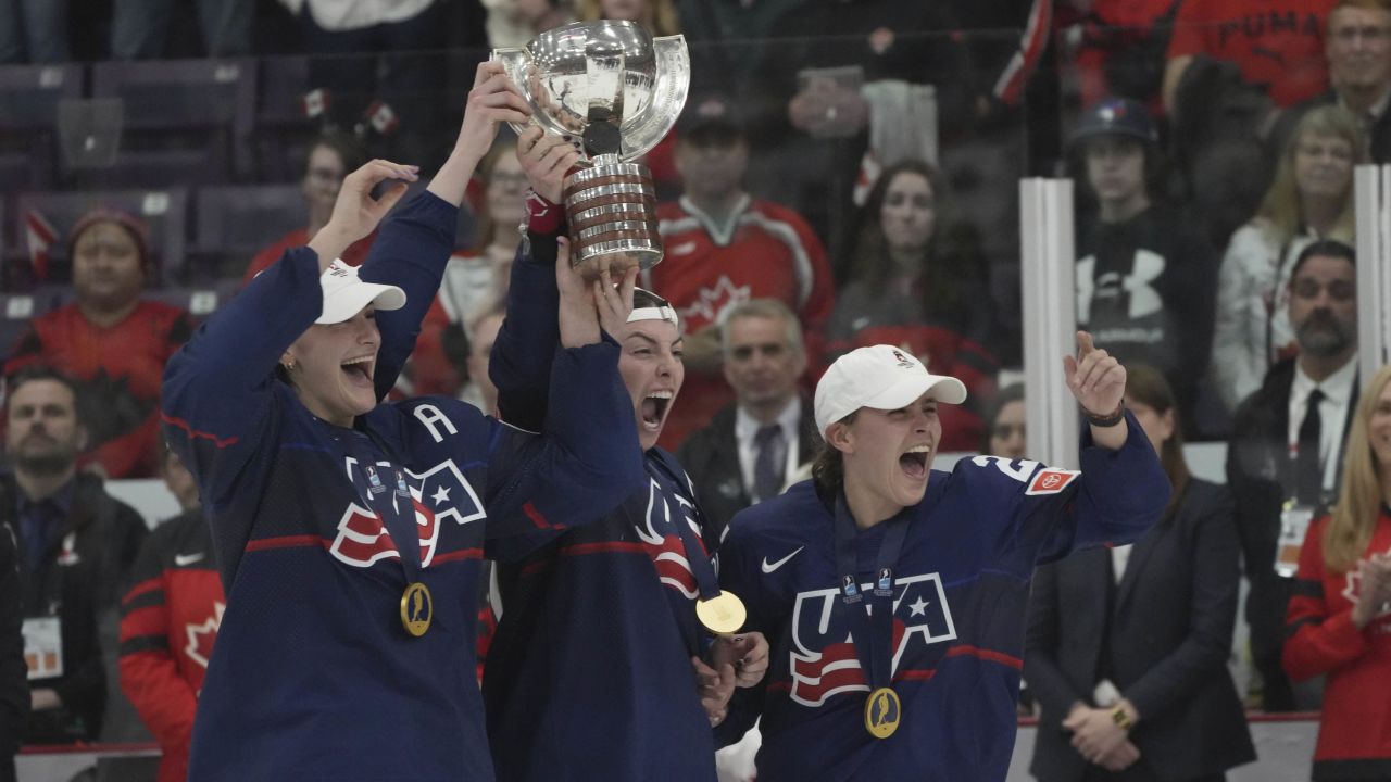 US players celebrate their victory over Canada in Brampton, Ontario, on April 16. 