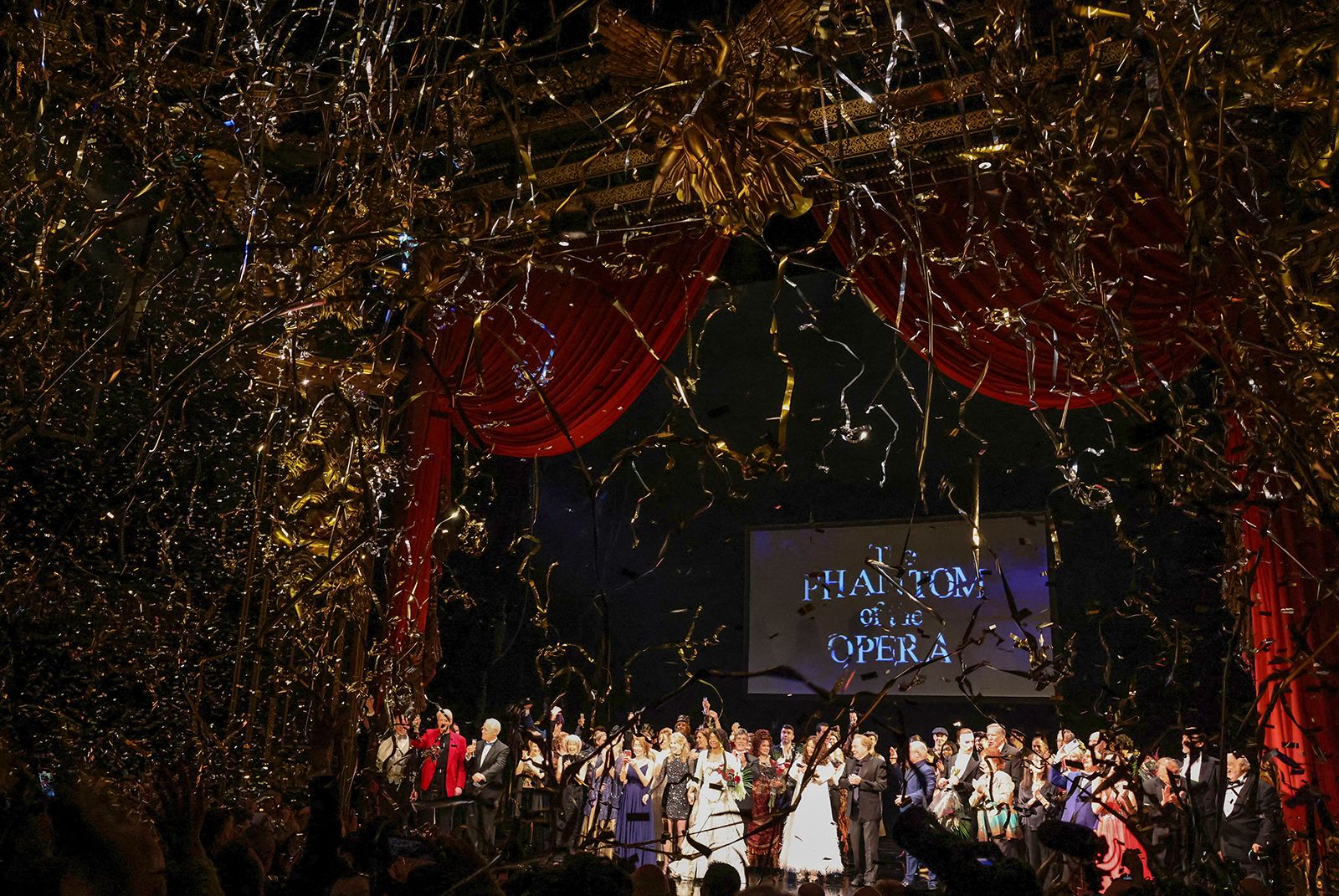 Cast and crew take a bow as confetti is released after the final performance of the Phantom of the Opera, which closed after 35 years on Broadway, in New York City, on April 16.