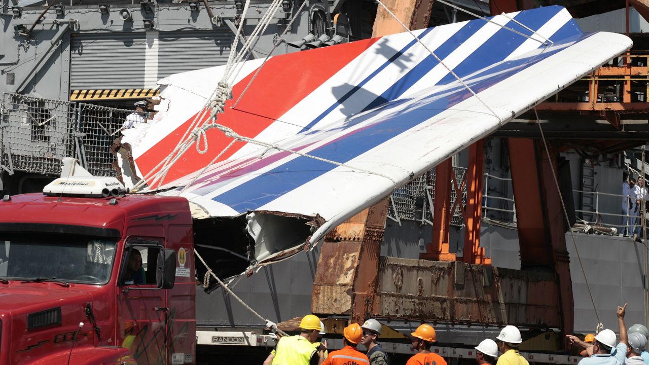 In this Sunday, June 14, 2009 file photo workers unload debris, belonging to crashed Air France flight AF447, from the Brazilian Navy's Constitution Frigate in the port of Recife, northeast of Brazil. 