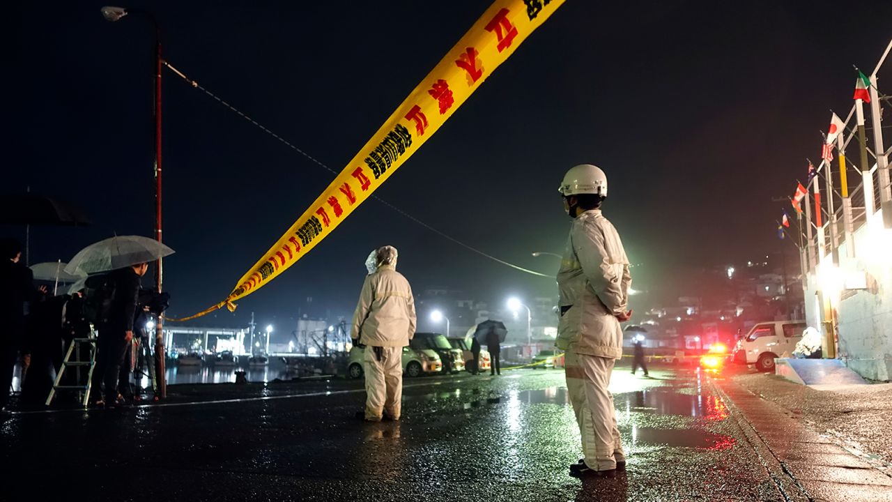 Police officers restrict entry into Saikazaki port in Wakayama, where a man threw an explosive just before Prime Minister Fumio Kishida was to make a campaign speech for a local governing party candidate on April 15, 2023.