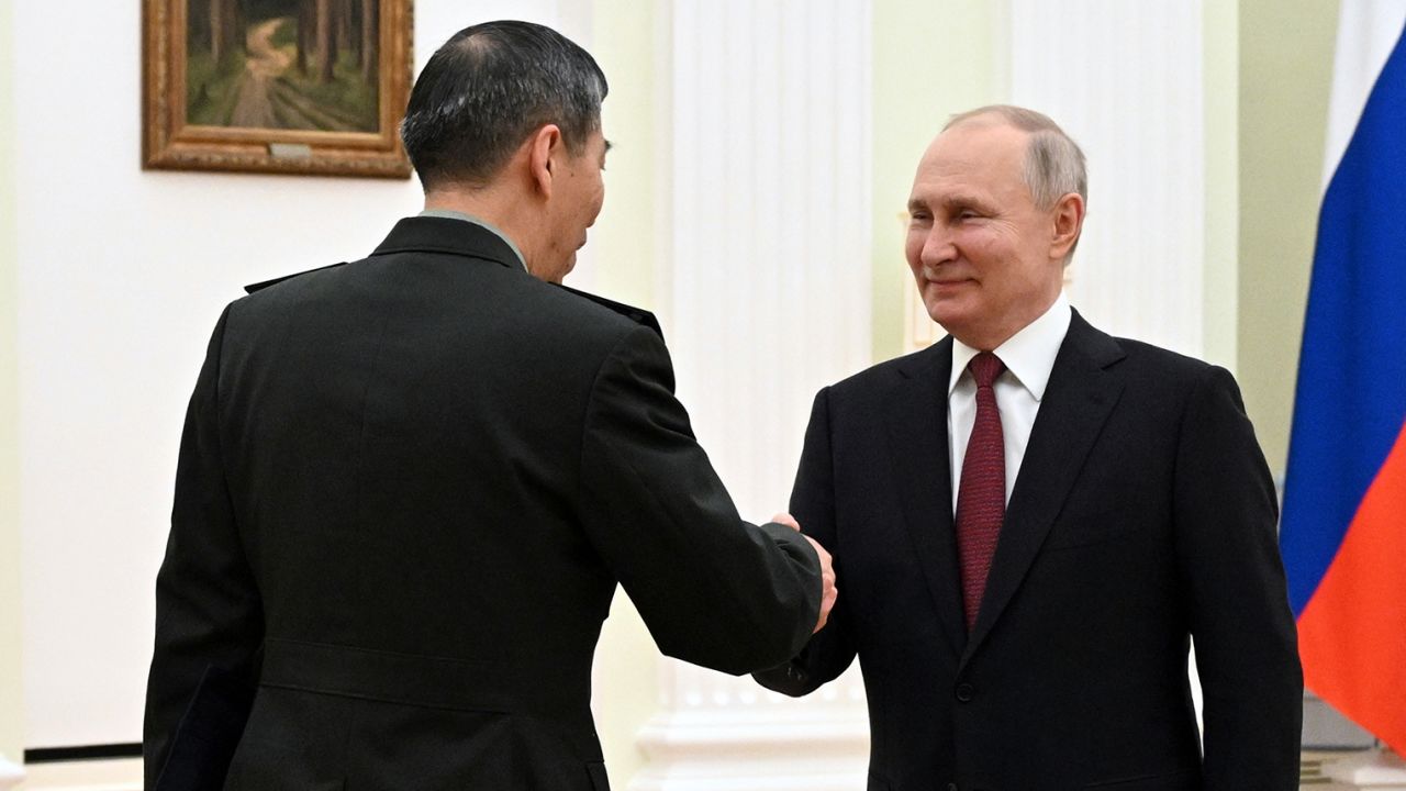 Russian President Vladimir Putin and Chinese Defense Minister Gen. Li Shangfu shake hands during their meeting at the Kremlin in Moscow, Russia on April 16, 2023.