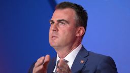 Oklahoma Gov. Kevin Stitt answers a question while taking part in a panel discussion during a Republican Governors Association conference, Wednesday, Nov. 16, 2022, in Orlando, Fla.