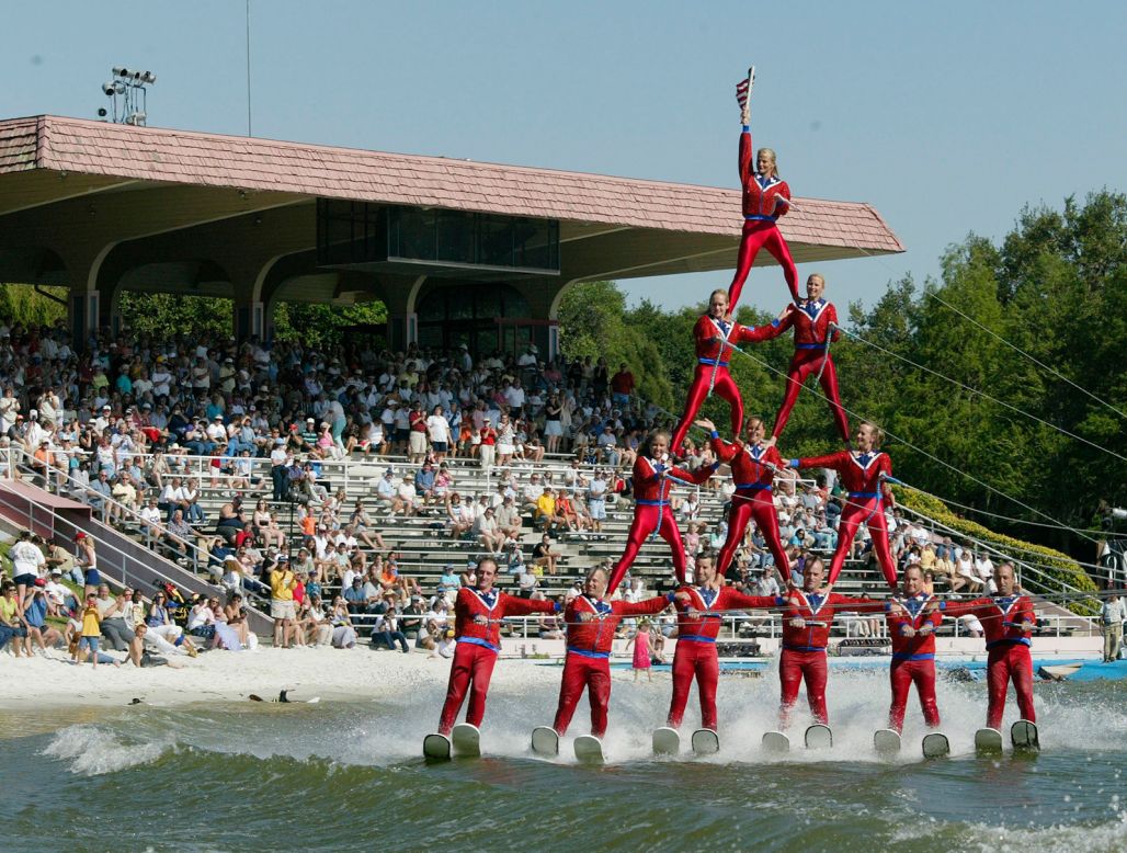 <strong>Cypress Gardens (Florida): </strong>Members of the Cypress Gardens ski show perform a pyramid as they pass the grandstands in 2003. The park closed in 2009 and was later absorbed into LEGOLAND Florida.  