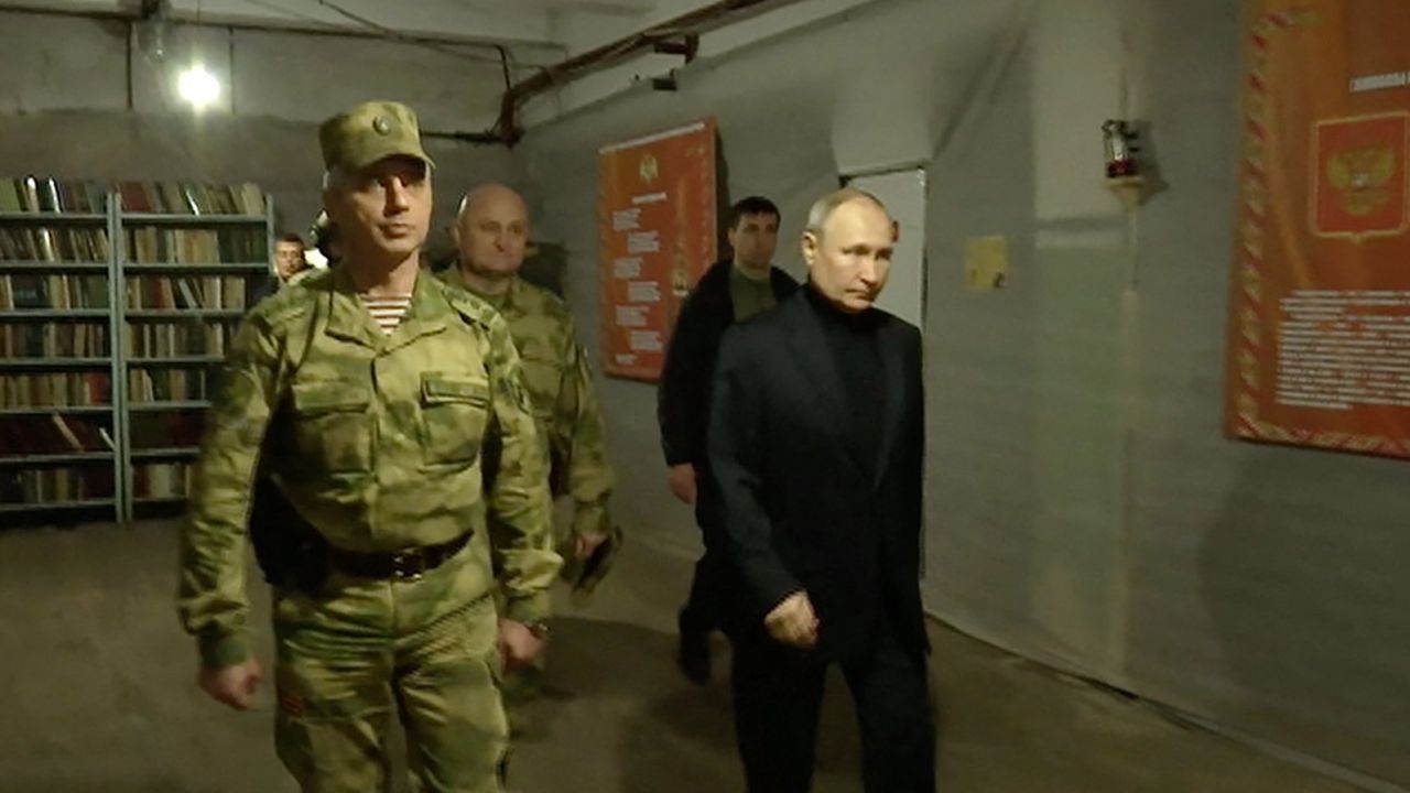 Putin visits the national guard headquarters in the occupied Luhansk region in eastern Ukraine.