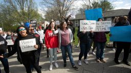 Protestors march Sunday, April 16, 2023, in Kansas City, Mo., to bring attention to the shooting of Ralph Yarl, 16, who was shot when he went to the wrong Kansas City house to pick up his brothers.