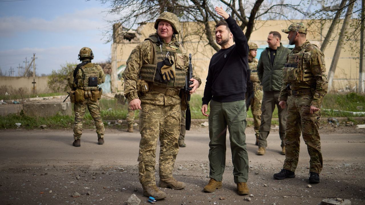 President Volodymyr Zelensky (right) visits at the frontline in Avdiivka in eastern Ukraine, on Tuesday.