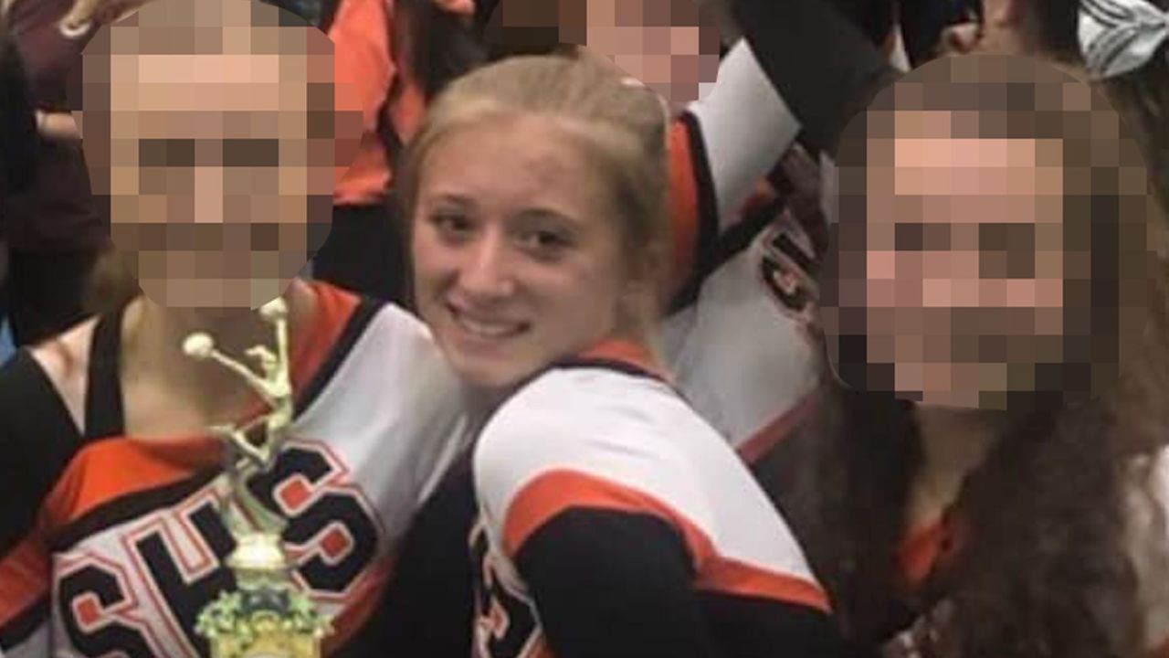 Gillis was "always smiling and laughing," her former cheerleading coach said. CNN blurred a portion of this image to protect individuals' identities.