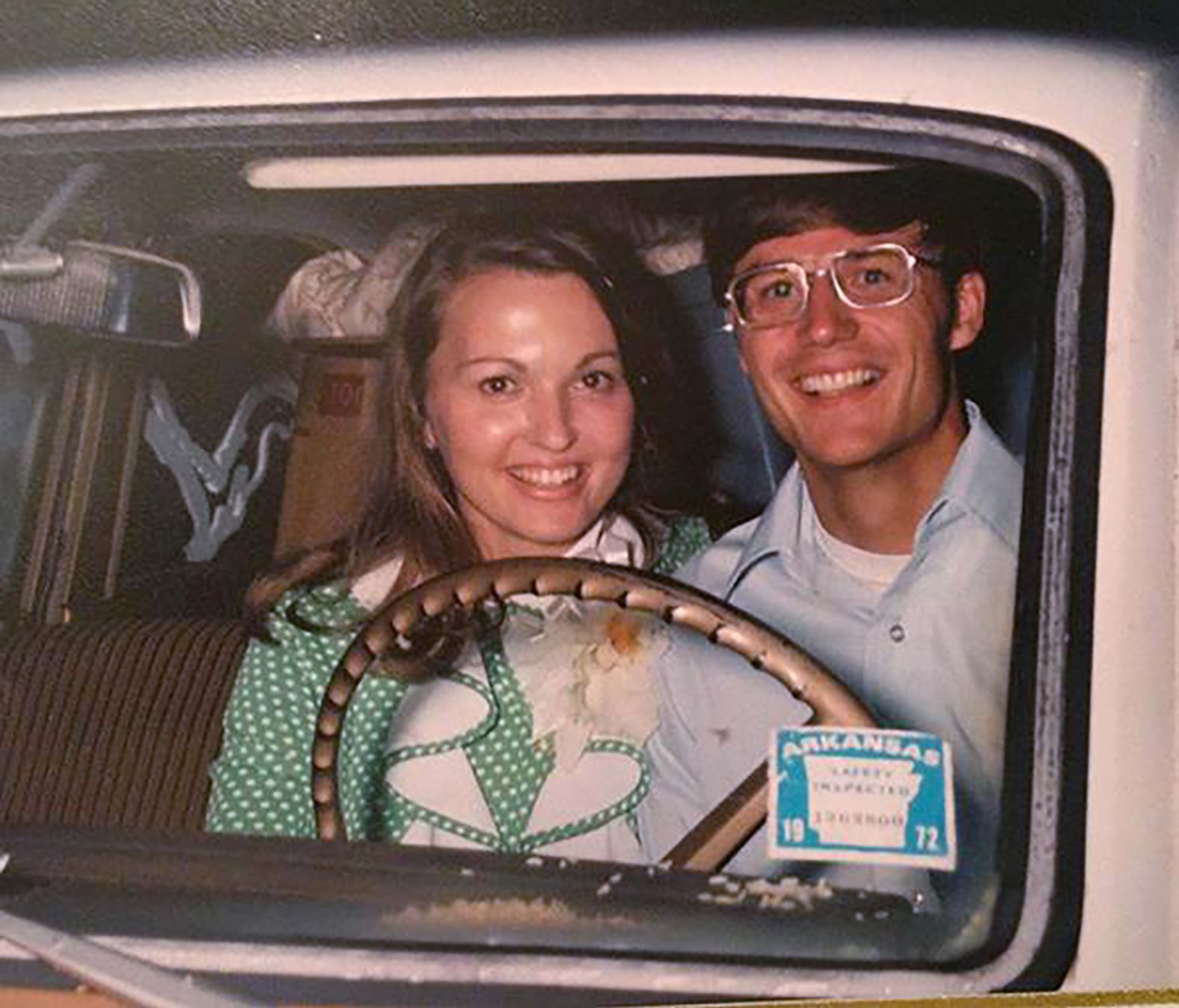 Hutchinson and his wife, Susan, ride in a car together in the early 1970s.