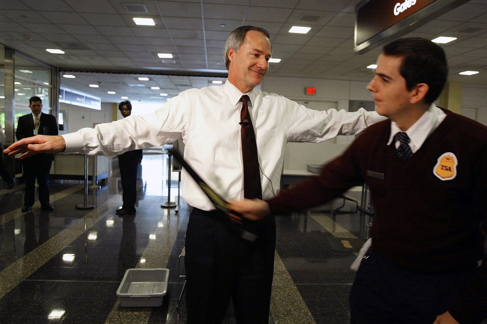 Hutchinson is screened by security while passing through an airport checkpoint in Arlington, Virginia, in 2003. He had begun a three-year stint in the Department of Homeland Security, serving as undersecretary for border and transportation security.