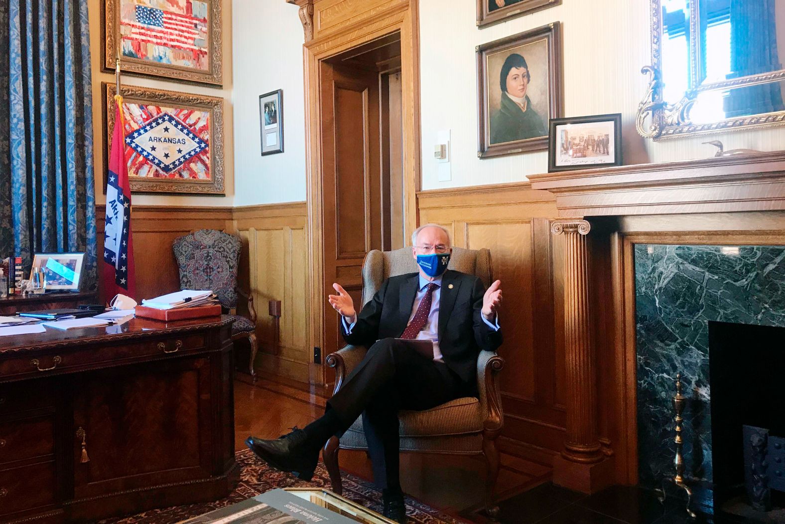 Hutchinson speaks in his office in Little Rock in January 2021. In what may differentiate him from other Republican candidates, Hutchinson as governor did not downplay the coronavirus when the pandemic hit the United States. He encouraged his constituents to get the vaccine but objected to the Biden administration's vaccine mandates. While he approved a statewide ban on face mask mandates, he later said he regretted doing so.