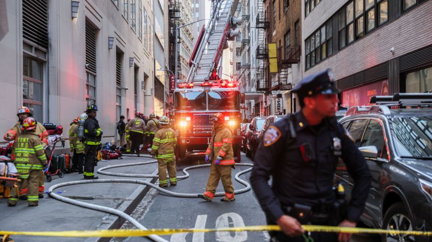 Firefighters work at the site of a collapsed parking garage in the Manhattan borough of New York City, U.S., April 18, 2023.  REUTERS/Brendan McDermid