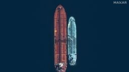 A satellite image taken on March 20 shows two tankers conducting a ship-to-ship transfer of Russian fuel oil off the southern coast of Greece. Transactions like these have surged in recent months, data shows.