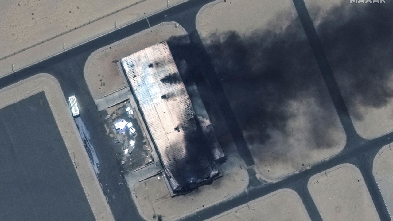 A satellite image shows a burning building at the Merowe Airbase on April 18. 