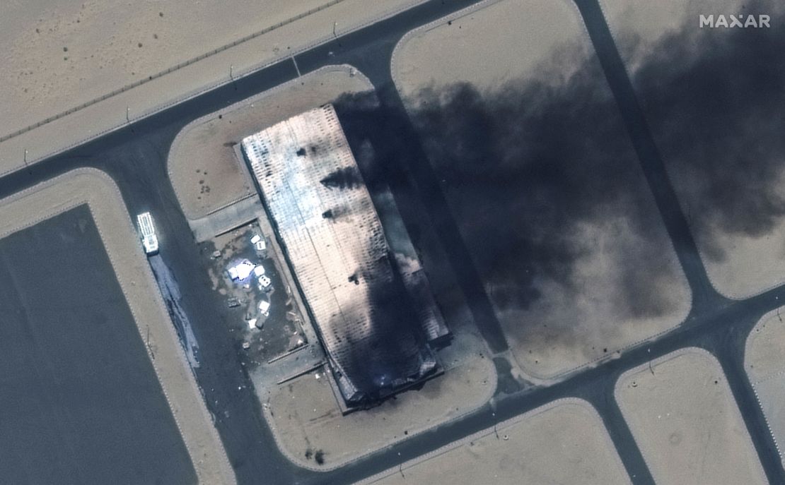 A satellite image shows a burning building at the Merowe Airbase on April 18.
