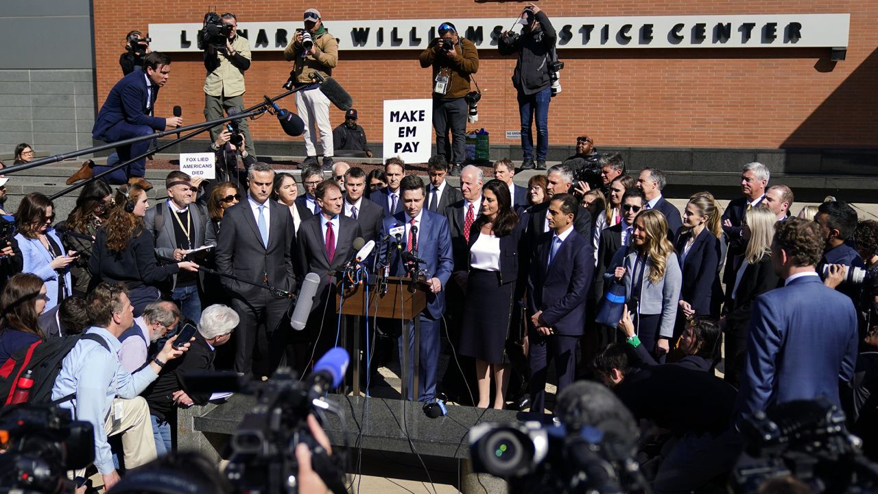 Attorneys for Dominion Voting Systems speak at a news conference outside New Castle County Courthouse in Wilmington, Del., after the defamation lawsuit by Dominion Voting Systems against Fox News was settled just as the jury trial was set to begin, Tuesday, April 18, 2023. (AP Photo/Matt Rourke)