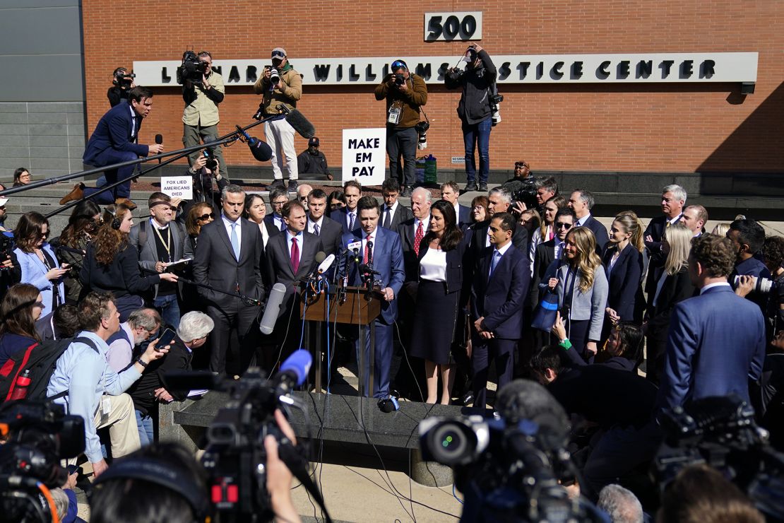 Attorneys for Dominion Voting Systems speak at a news conference outside New Castle County Courthouse in Wilmington, Del., after the defamation lawsuit by Dominion Voting Systems against Fox News was settled just as the jury trial was set to begin, Tuesday, April 18, 2023. (AP Photo/Matt Rourke)