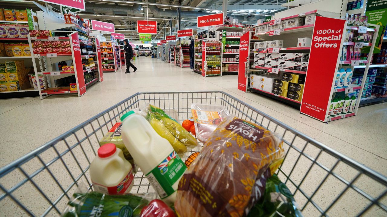A shopping trolley is seen at a supermarket in Manchester, UK on March 22, 2023.