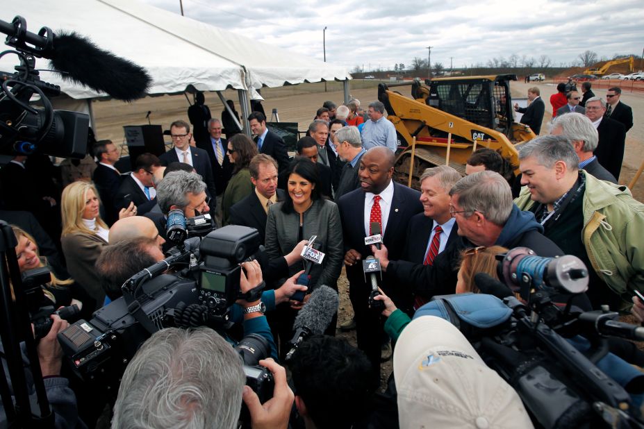 Scott is flanked by Haley and US Sen. Lindsey Graham after a groundbreaking event for the inland port in Greer, South Carolina, in March 2013.