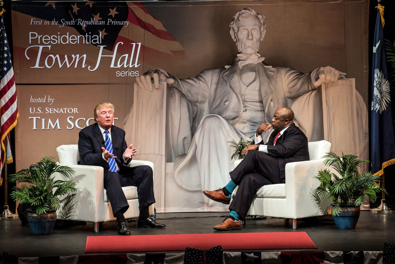 Scott hosts a town hall event in Columbia, South Carolina, as presidential candidate Donald Trump speaks to voters in September 2015.