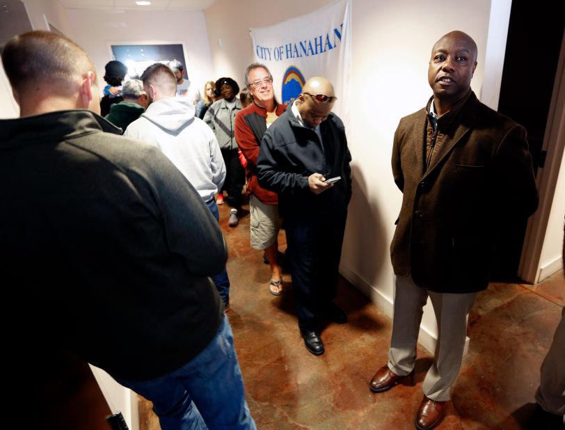 Scott waits in line to vote in Hanahan, South Carolina, in November 2016. He won reelection that year.