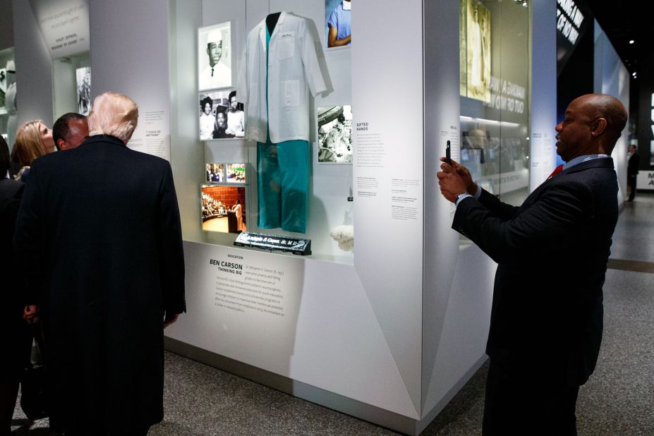 Scott takes a photo of President Trump during a tour of the National Museum of African American History and Culture in February 2017.