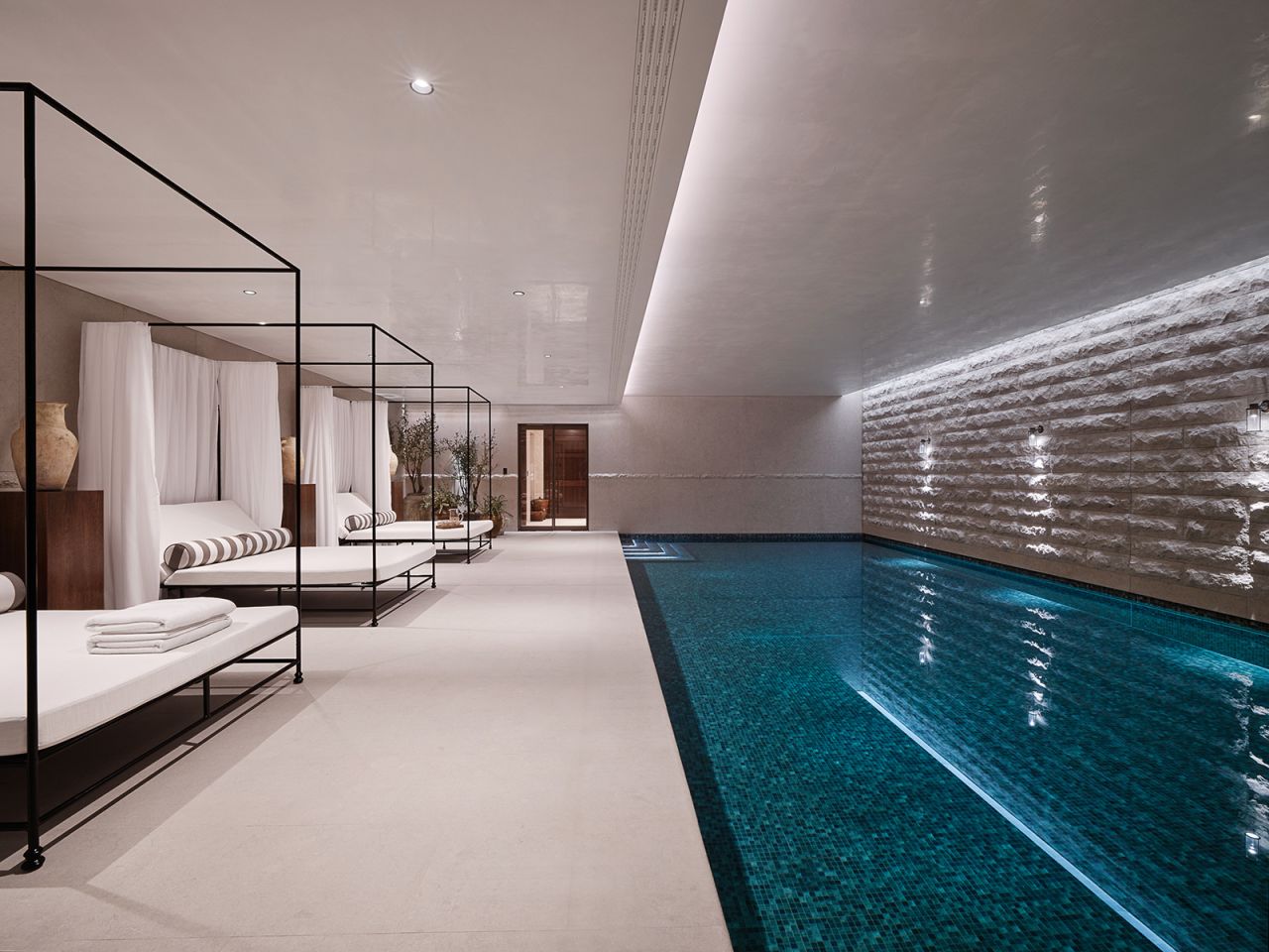 The townhouse includes a 39-foot-long private pool as well as a spa, rooftop terace and screening room.