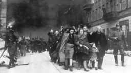 A  group of Polish Jews were led away for deportation by German SS soldiers, during the destruction of the Warsaw Ghetto by German troops after an uprising in the Jewish quarter in 1943. 